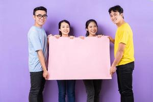 Asian best friends posing on purple background photo