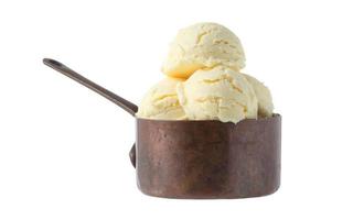 Vanilla ice cream in copper pot on white background photo