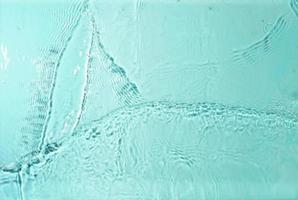 Textura de salpicaduras de agua sobre fondo pastel foto
