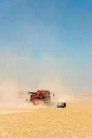 Dust in Wheat Field photo