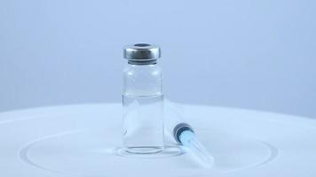 Injection drug and syringe on white background video