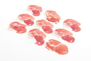 Fresh pork sliced on white background photo