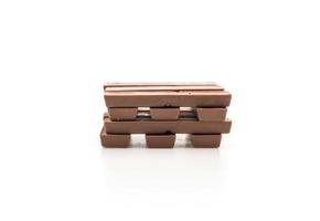 Chocolate bars on white background photo