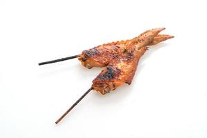 Grilled or barbecue chicken wings skewer with sticky rice