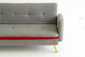 Empty grey sofa in living room photo