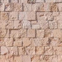 White tiles stone wall texture. photo