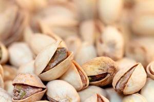 Pile of Pistachios. Out of focus background.