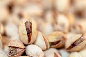 Pile of Pistachios. Out of focus background.
