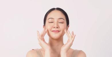 Young asian woman beauty face make up for skincare cosmetic photo