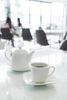 Hot tea cup on the table photo