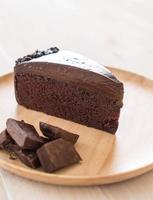 Chocolate cake on wood plate