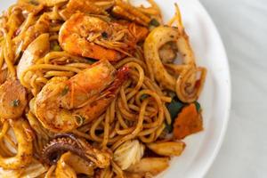 Stir-fried Tom Yum seafood dried spaghetti - Fusion food style photo