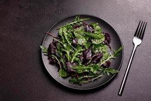 Healthy food, salad mix with arugula, spinach, bulls blood photo