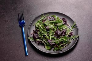 Healthy food, salad mix with arugula, spinach, bulls blood photo