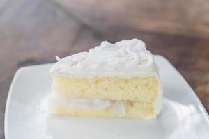 Coconut cake on white plate photo