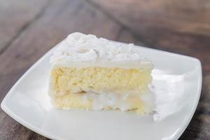 Coconut cake on white plate photo