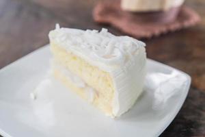 Coconut cake on white plate photo