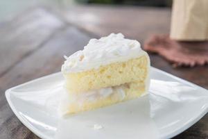 Coconut cake on white plate photo