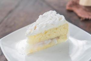 Coconut cake on white plate photo