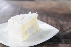 Coconut cake on white plate photo