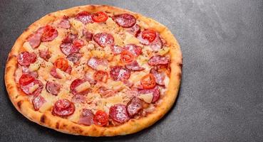 Pepperoni Pizza with Mozzarella cheese, salami, ham photo