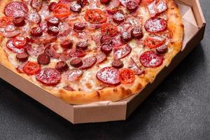 Pepperoni Pizza with Mozzarella cheese, salami and ham photo