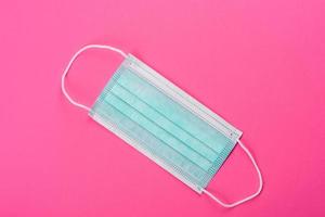 Medical mask on a colored background photo
