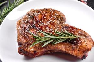 Fresh delicious juicy steak on the bones photo