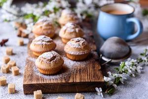 Fresh baked cupcakes of rice flour with banana and vanilla photo