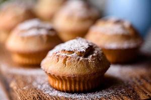 Fresh baked cupcakes of rice flour with banana and vanilla photo