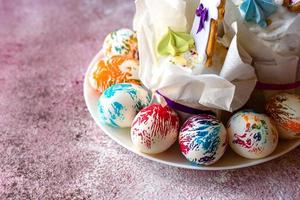 Easter bright multicolored eggs with Easter pies photo