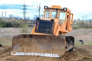 Industrial building construction site bulldozer photo