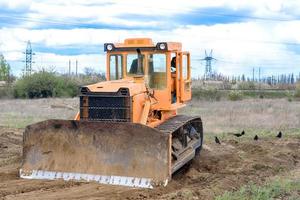 Industrial building construction site bulldozer photo