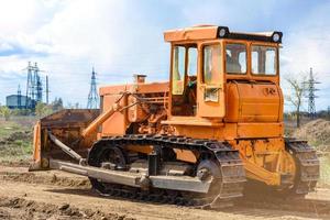 Industrial building construction site bulldozer photo