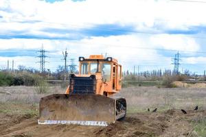 Excavadora de obra de construcción industrial foto