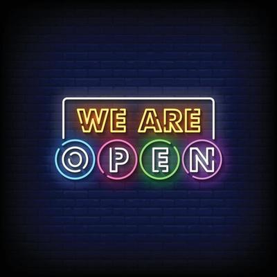 We are Open Neon Signboard On Brick Wall