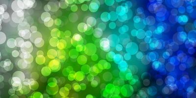 Light Blue, Green vector backdrop with dots.