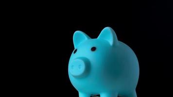 piggy bank on black background Money saving concept video