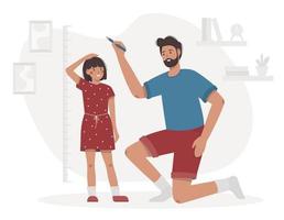 Father measures the child height in the room vector