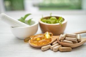 Alternative medicine herbal organic capsule with vitamin E omega 3 photo