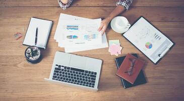 Businessman woman hands reviewing analyzing financial data chart. photo