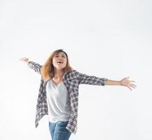 Freedom young hipster woman raising hands with isolated over photo