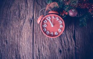 Red alarm clock waiting for time of xmas photo