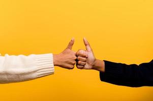 Asian girls holding hands expressing sincerity photo