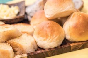 Mixed bread on dining table photo