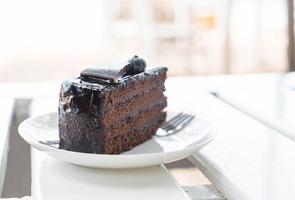 Chocolate fudge cake in cafe photo