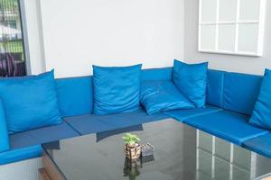 Beautiful luxury pillow on sofa decoration in livingroom interior photo