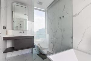 White Modern and Wood Bathroom with Shower Cabin Glass in Apartment photo