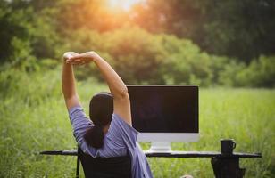 Woman working in an outdoor office photo