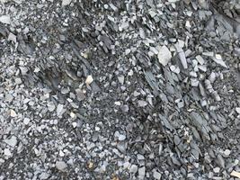 Mountain rock with gray stones, Caucasus. Background, close up